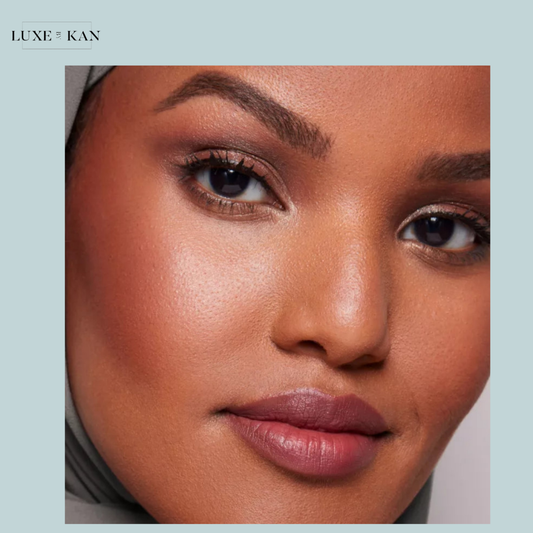 A soft, abstract design featuring warm hues of orange and pink, blending into a subtle gradient.