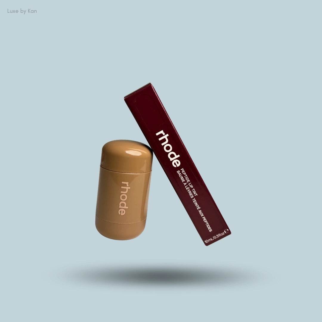 Rhode fall duos, showing pocket blush in a tan container and a peptide lip tint with dark red container.