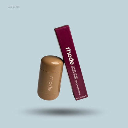 Rhode fall duos consist of a pocket blush in a tan cylindrical container and a peptide lip tint in a maroon rectangular box.