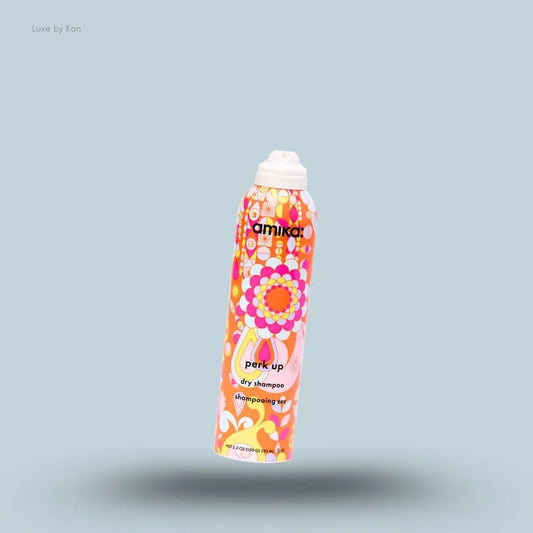  Amika Perk Up Dry Shampoo bottle on blue background — Luxe by Kan India