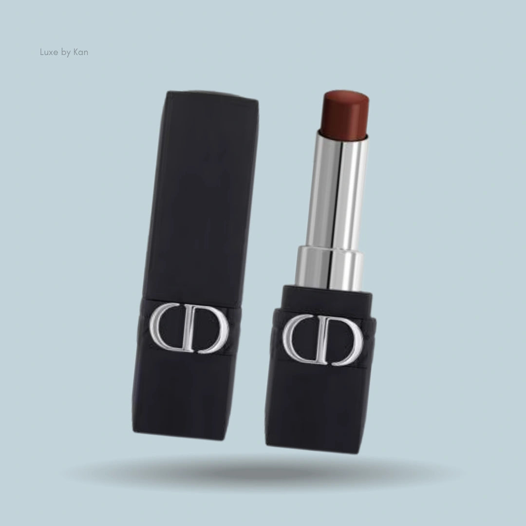 Rouge Dior Forever Lipstick in an open tube, showcasing a rich brown shade with a smooth matte finish.