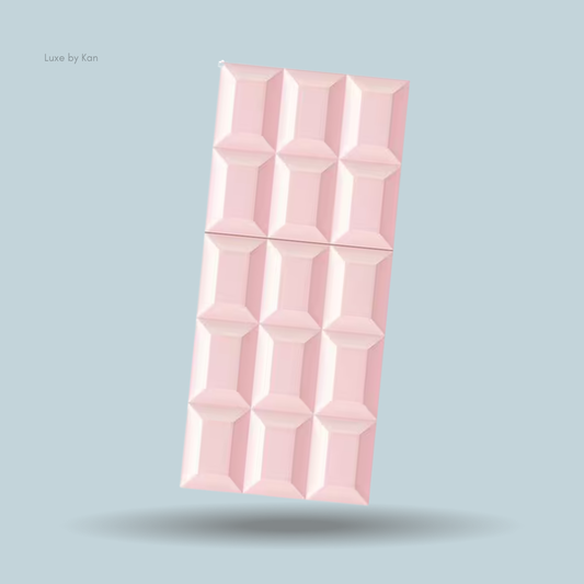 Sabrina Carpenter Sweet Tooth Eau de Parfum in a light pink chocolate bar-shaped bottle with molded rectangles.