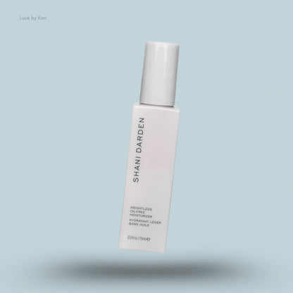 A white bottle of Shani Darden Skin Care Weightless Oil-Free Moisturiser.