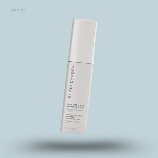 Shani Darden Skin Care Moisture Boost Plumping Serum is in a white container with product details.