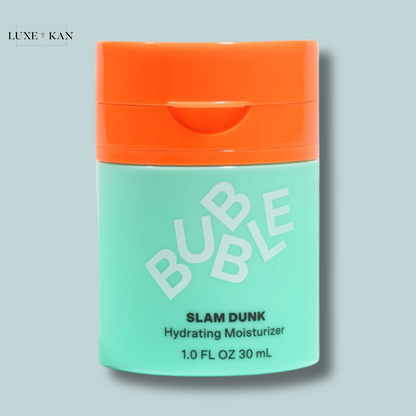 "Slam Dunk" hydrating moisturizer with an orange lid, labeled with bold white letters.