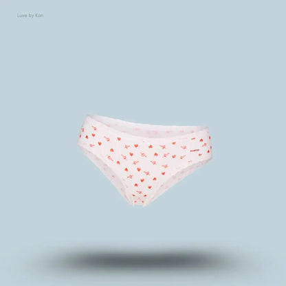SKIMS Lightweight Cotton Pointelle Lace Brief in Snow Arrowed Hearts, flat lay on light blue background
