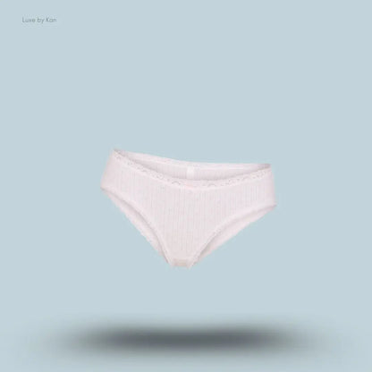 SKIMS Lightweight Cotton Pointelle Lace Brief in Snow Peony Pin Dot, flat lay on light blue background