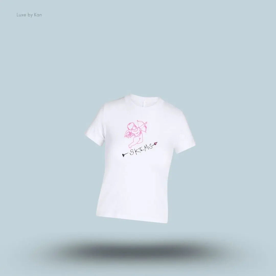 SKIMS Worn In Jersey T-Shirt in Snow Skims Angel, flat lay on light blue background