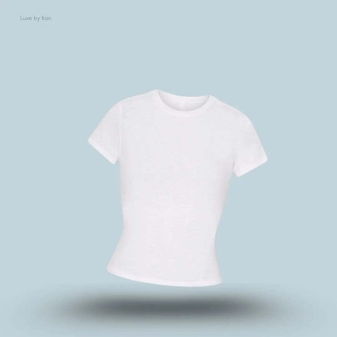 SKIMS Worn In Jersey T-Shirt in Snow, flat lay on light blue background
