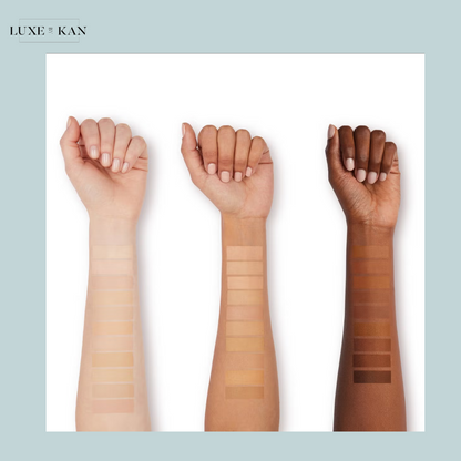 Three arms displaying diverse skin tones with swatches of foundation shades, ranging from light to deep brown.