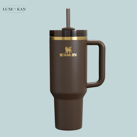 Chocolate gold Stanley the Quencher H2.0 FlowState™ tumbler with a handle and straw.