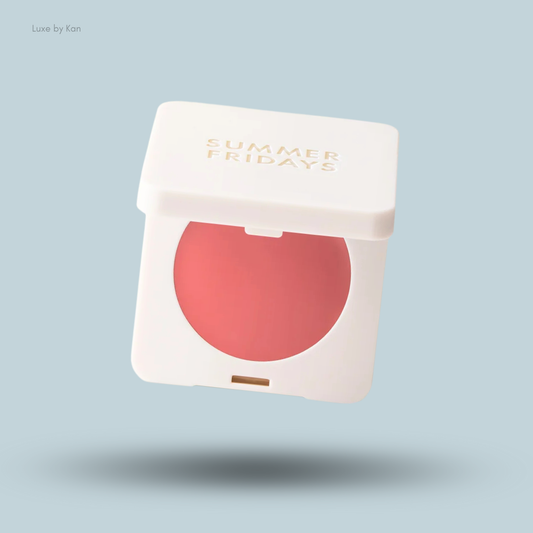 Summer Fridays Blush Butter Balm compact with white casing, open to reveal a circle of coral blush.