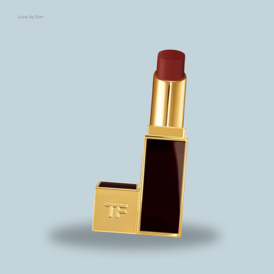 A luxurious Tom Ford Satin Matte Lip Color lipstick tube featuring a deep red shade, elegantly designed with a glossy maroon base.