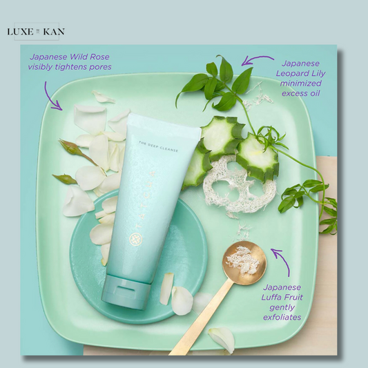 A calming turquoise display featuring Tatcha's The Deep Cleanse, surrounded by Japanese ingredients like Wild Rose, Leopard Lily, and Luffa Fruit.