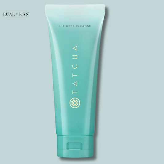 A tube of Tatcha's "The Deep Cleanse" facial cleanser, featuring a light blue design with gold text and a logo.