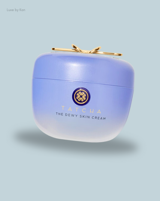 Tatcha The Dewy Skin Cream in a soft lavender jar with a gold-accented lid.