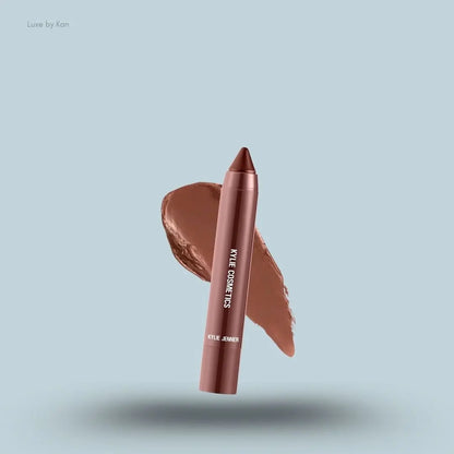 Kylie Cosmetics Matte Lip Crayon stick and swatch on blue background — Luxe by Kan India