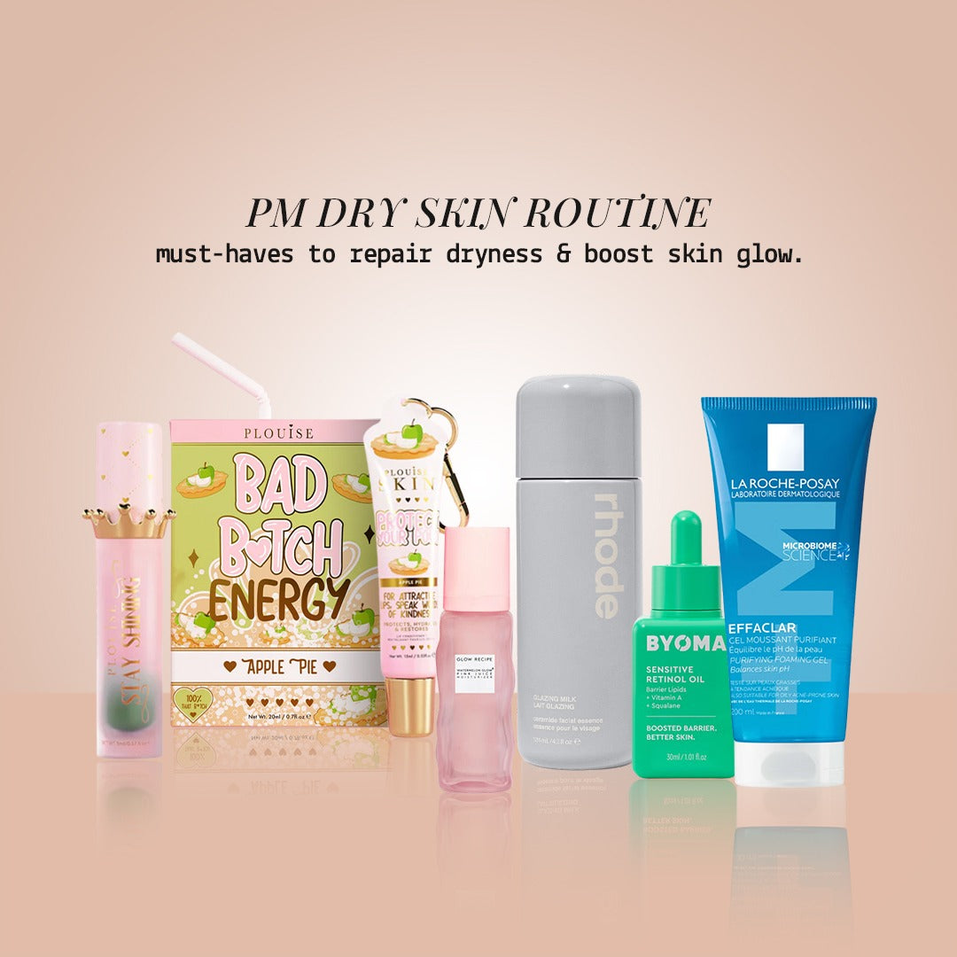 PM Dry Skin Routine products featuring Rhode, Byoma, and La Roche-Posay items on a reflective peach background.