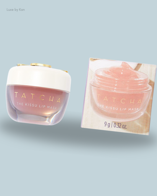 A Tatcha Kissu Lip Mask jar with a creamy pink product, alongside its packaging.