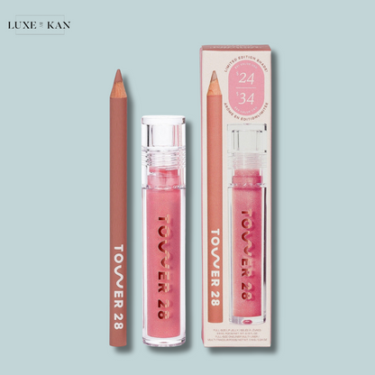 A Tower 28 limited-edition Line + Shine Lip Kit featuring a mauve lip pencil and a pink lip gloss in sleek packaging.