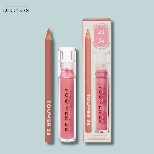 A Tower 28 limited-edition Line + Shine Lip Kit featuring a mauve lip pencil and a pink lip gloss in sleek packaging.
