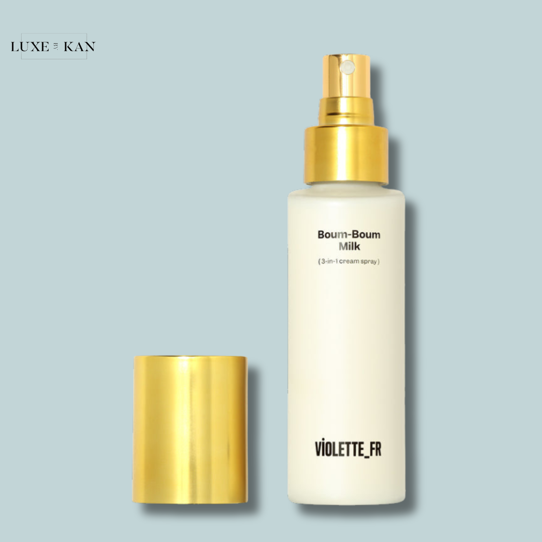 VIOLETTE FR 3-in-1 moisturising cream spray bottle labeled "Boum-Boum Milk" with a golden cap.