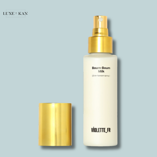 VIOLETTE FR 3-in-1 moisturising cream spray bottle labeled "Boum-Boum Milk" with a golden cap.