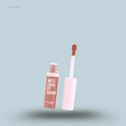 Kylie Cosmetics Matte Liquid Eyeshadow bottle on blue background — Luxe by Kan India