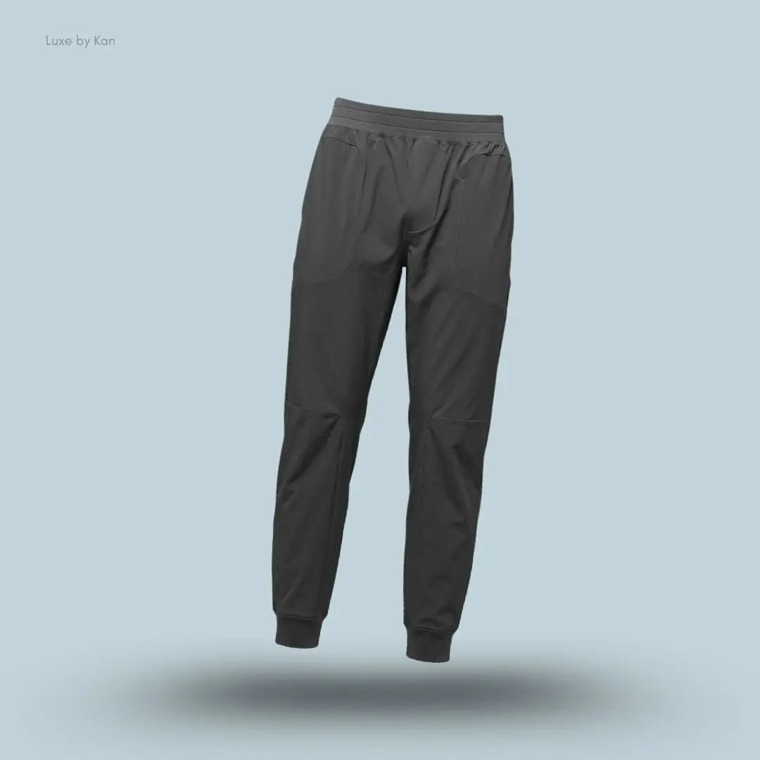 Alo Co-Op Pant in Anthracite, flat lay on light blue background
