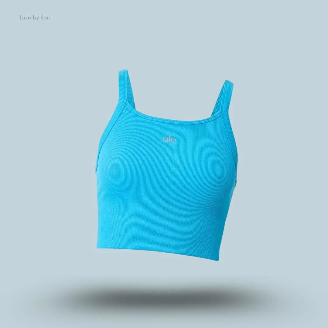Alo Seamless Ribbed Favorite Bra Tank in Azure Blue, flat lay on light blue background