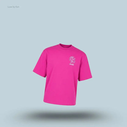 Gymshark Performance T-Shirt in pink shade displayed on a blue background with an oversized boxy-fit short-sleeve design