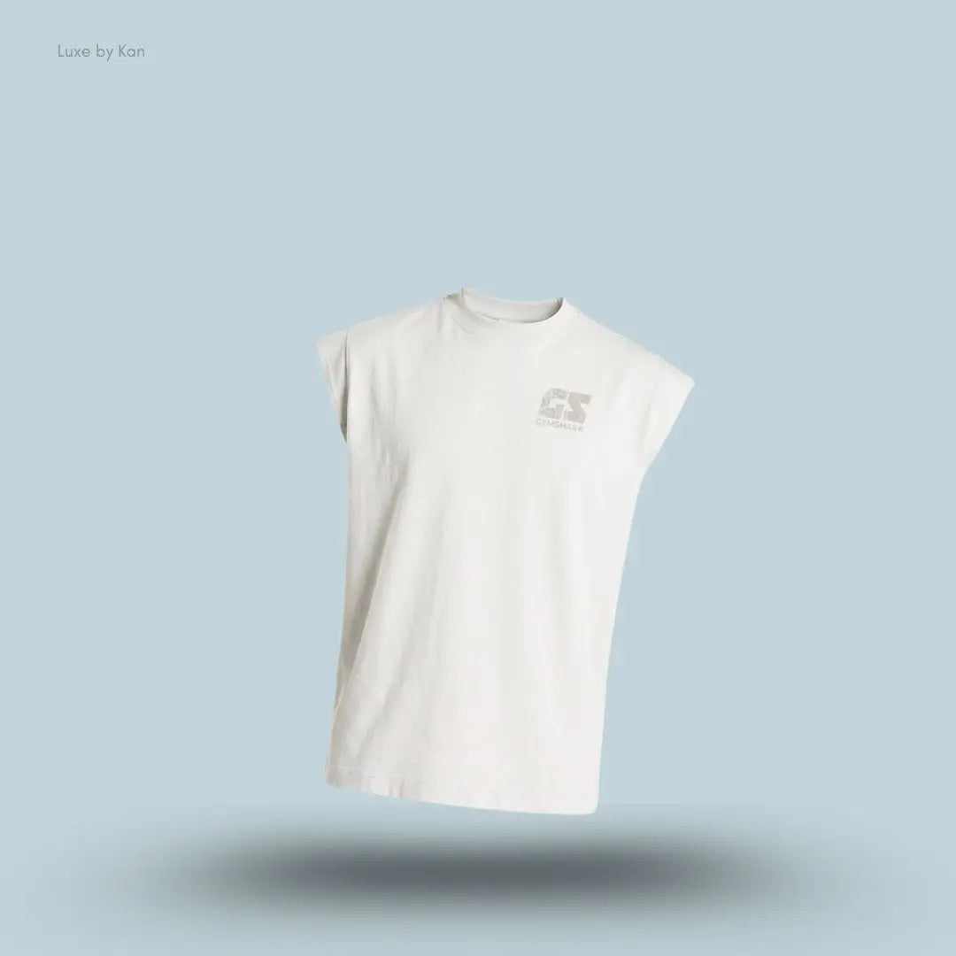 Gymshark Accent Capped Sleeve T-Shirt in tinted white shade displayed on a blue background with an oversized men's T-shirt design