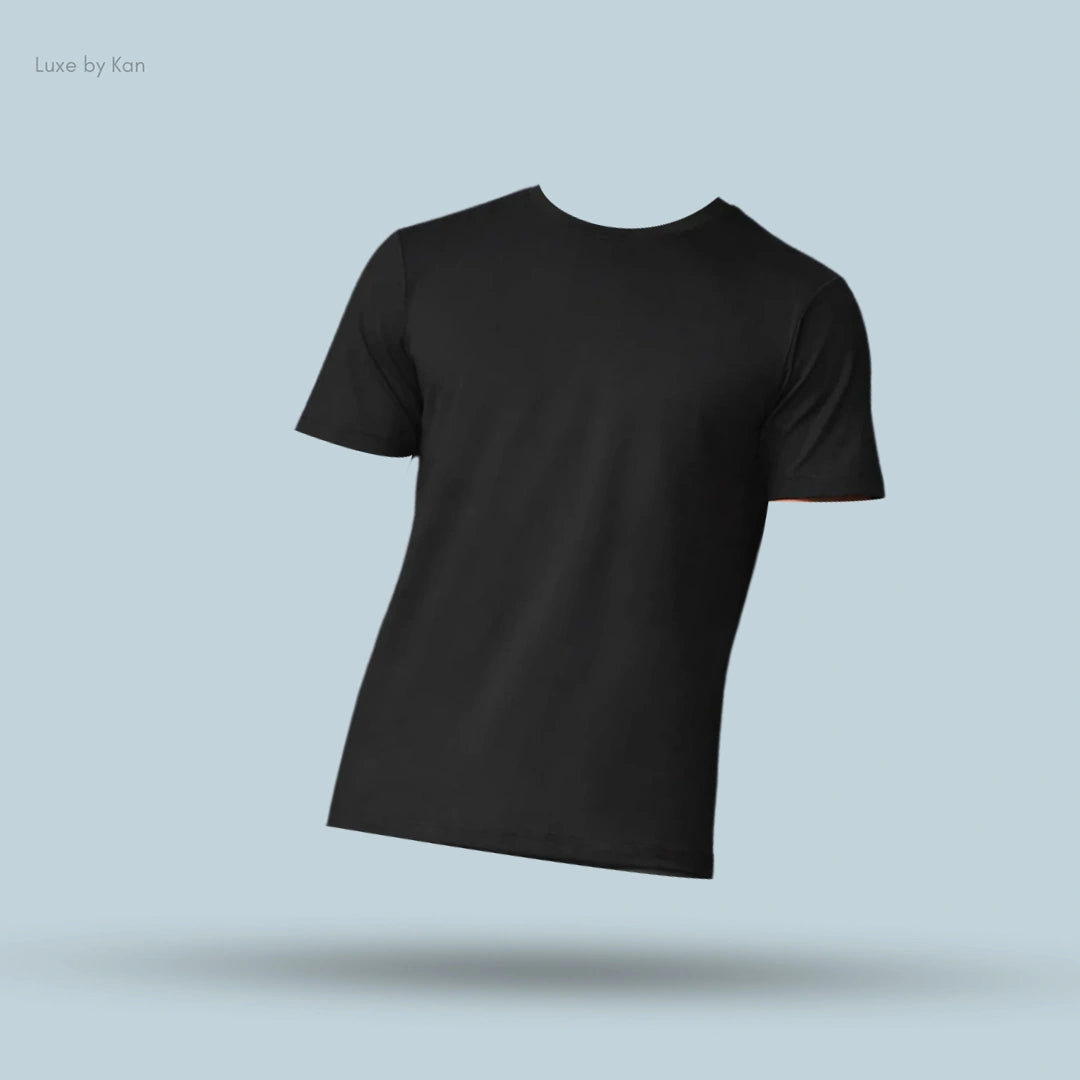 Alo Conquer Reform Crewneck Short Sleeve in Black, flat lay on light blue background