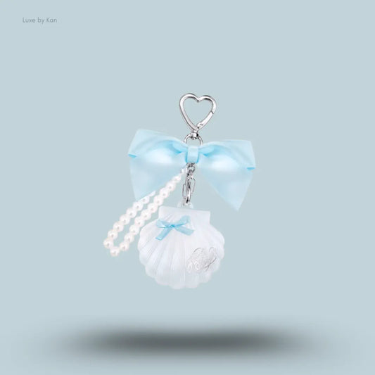 Flower Knows Shell's Jewel Highlighter Balm in Blue Tears, icy sapphire shimmer in seashell charm