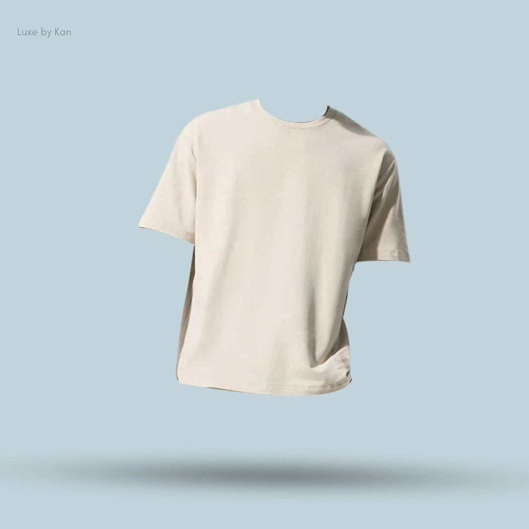 Alo Double Take Short Sleeve in Bone, flat lay on light blue background