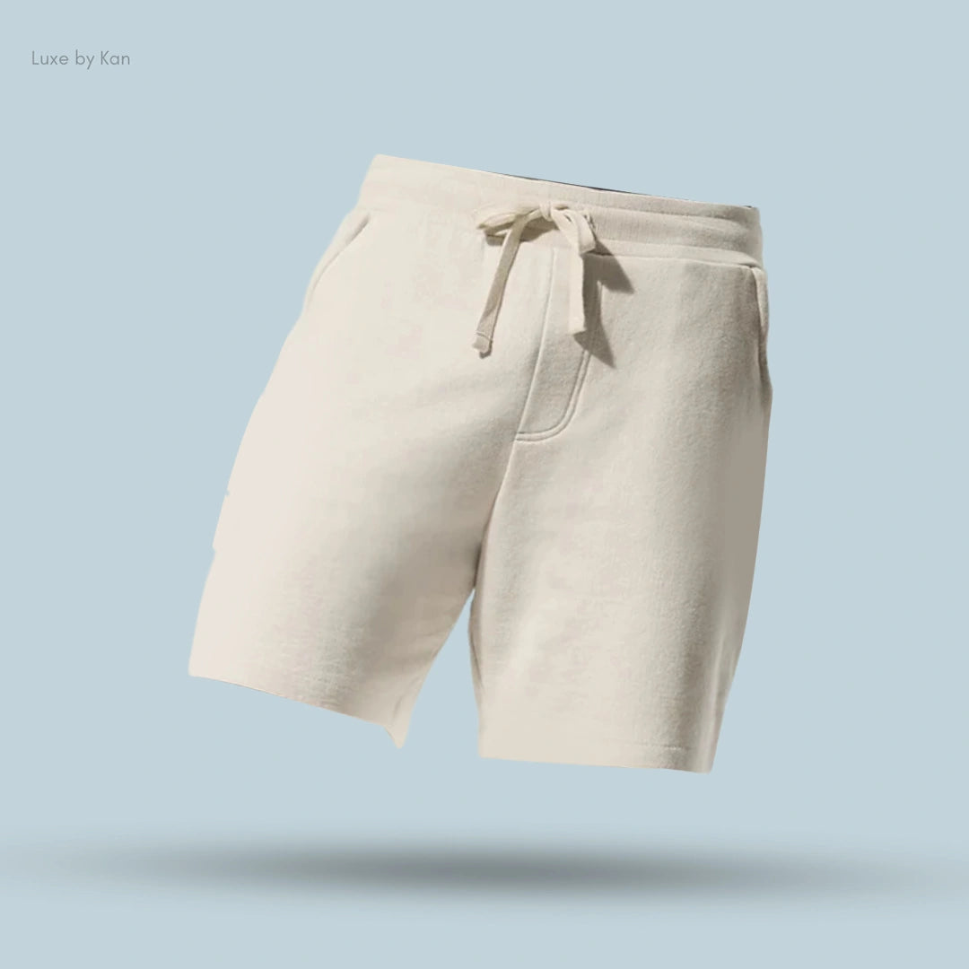 Alo Chill Short in Bone, flat lay on light blue background