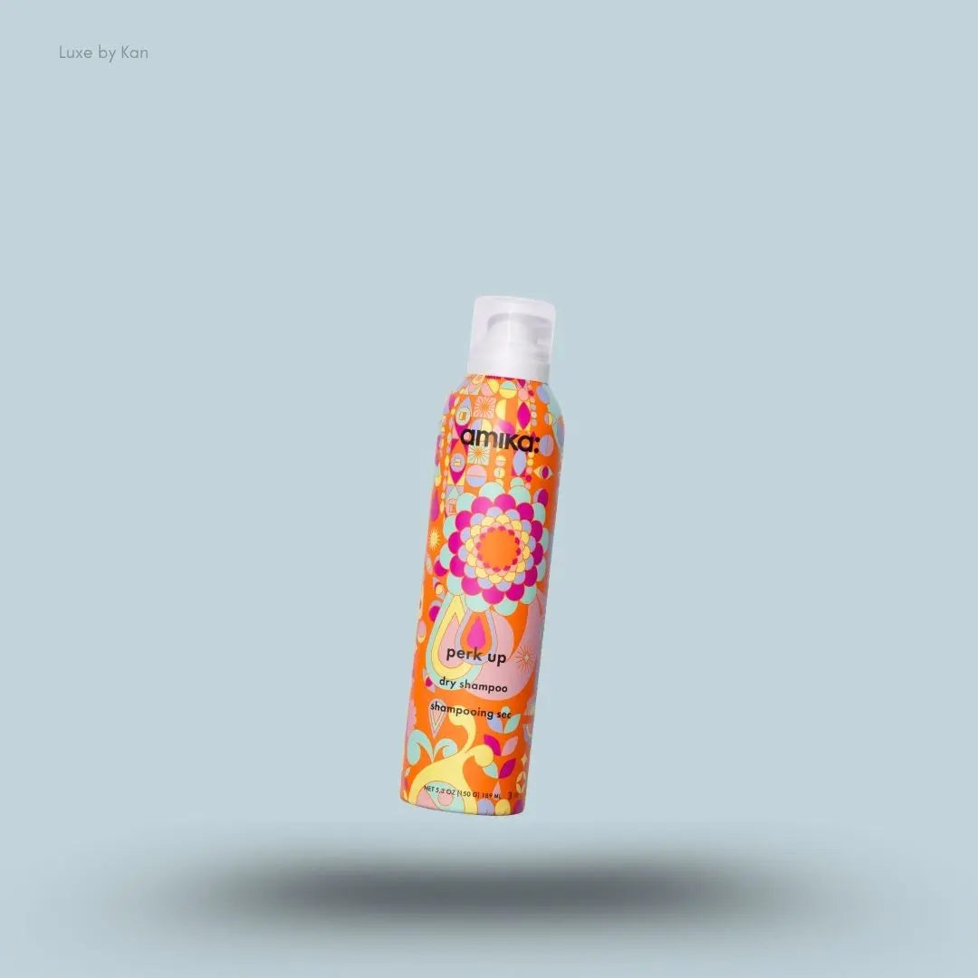  Amika Perk Up Dry Shampoo bottle on blue background — Luxe by Kan India