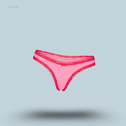 SKIMS Lightweight Cotton Lace Thong in Carnation Contrast, flat lay on light blue background