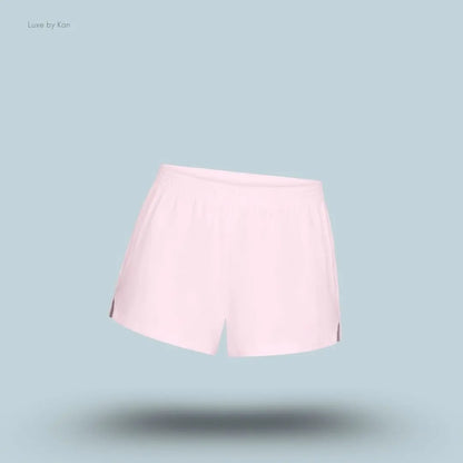 SKIMS Cotton Jersey Loose Short in Cherry Blossom, flat lay on light blue background