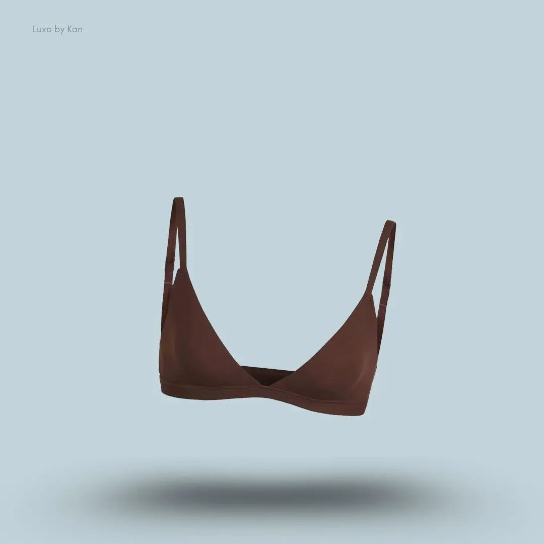Skims Fits Everybody Triangle Bralette in dark brown, front view on a light blue background with a floating product display.