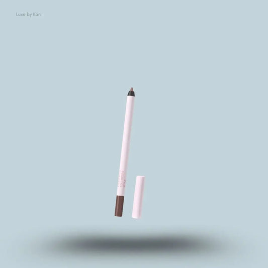 Kylie Cosmetics Plumping Lip Liner stick on blue background — Luxe by Kan India