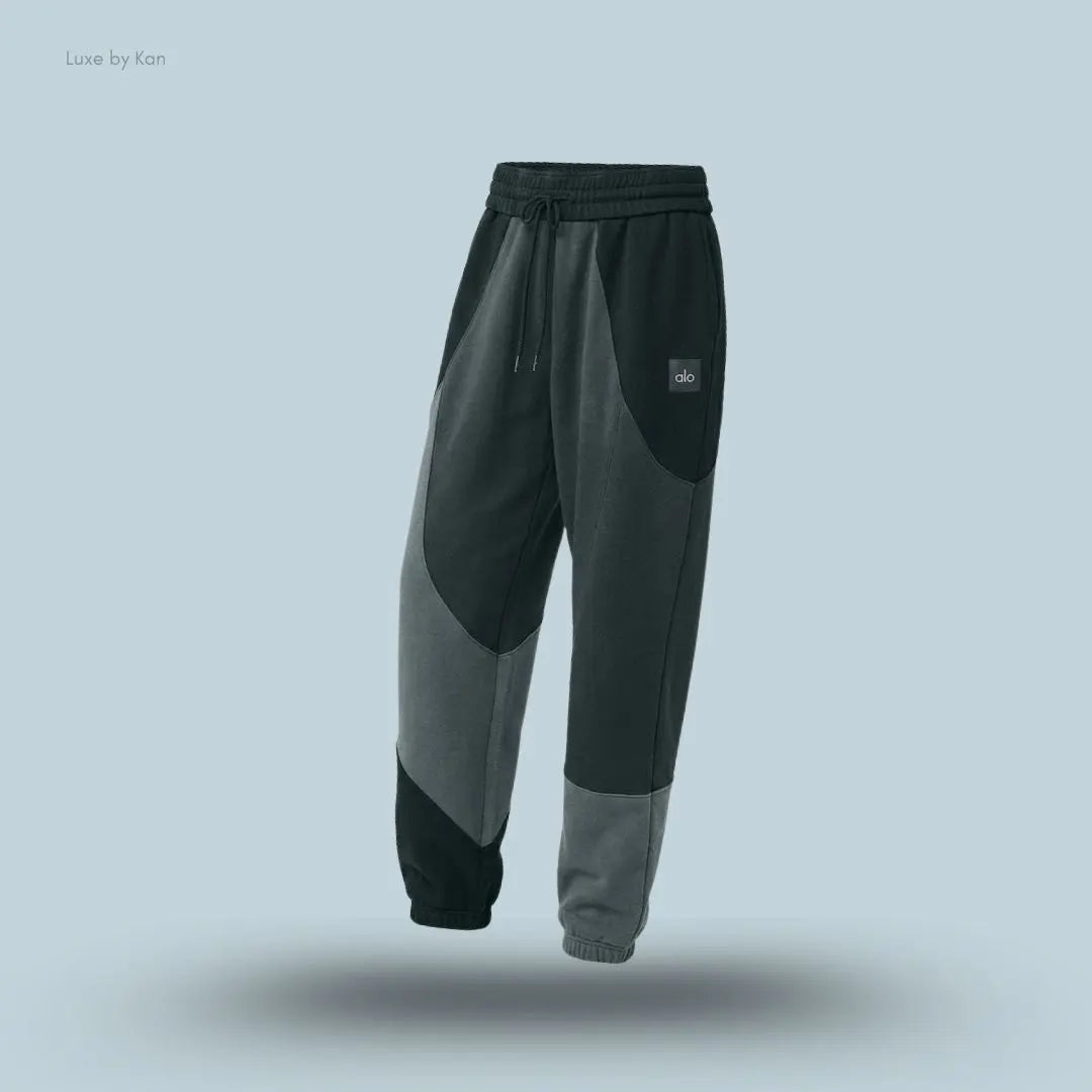 Alo Make Waves Sweatpant in charcoal green Tonal, flat lay on light blue background