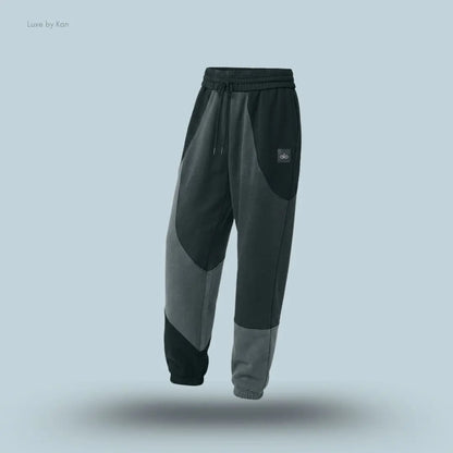 Alo Make Waves Sweatpant in charcoal green Tonal, flat lay on light blue background