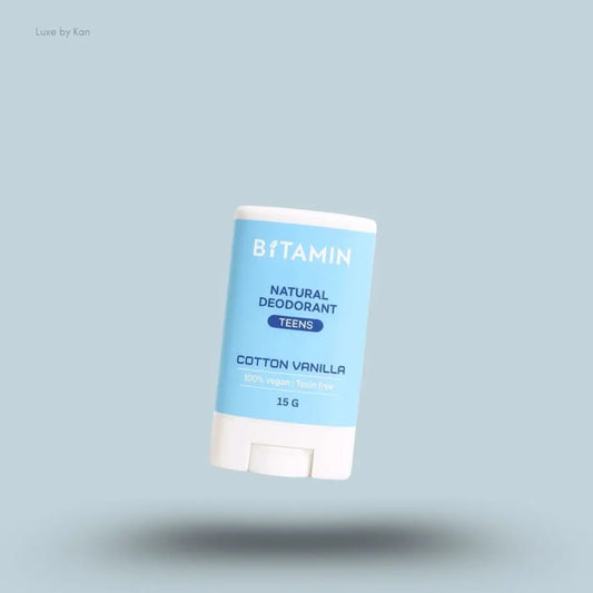 Bitamin Cotton Vanilla Teens Natural Deodorant 15g bottle on blue background — Luxe by Kan India