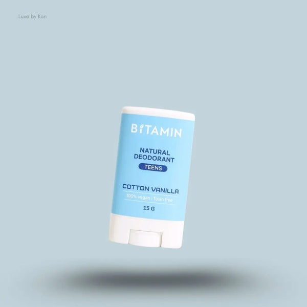 Bitamin Cotton Vanilla Teens Natural Deodorant 15g bottle on blue background — Luxe by Kan India