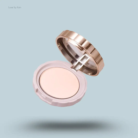 Canmake Secret Beauty Powder in 02 Natural, open pressed powder compact