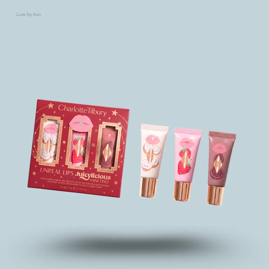 charlotte tilbury lip mini trio with packaging on blue background.
