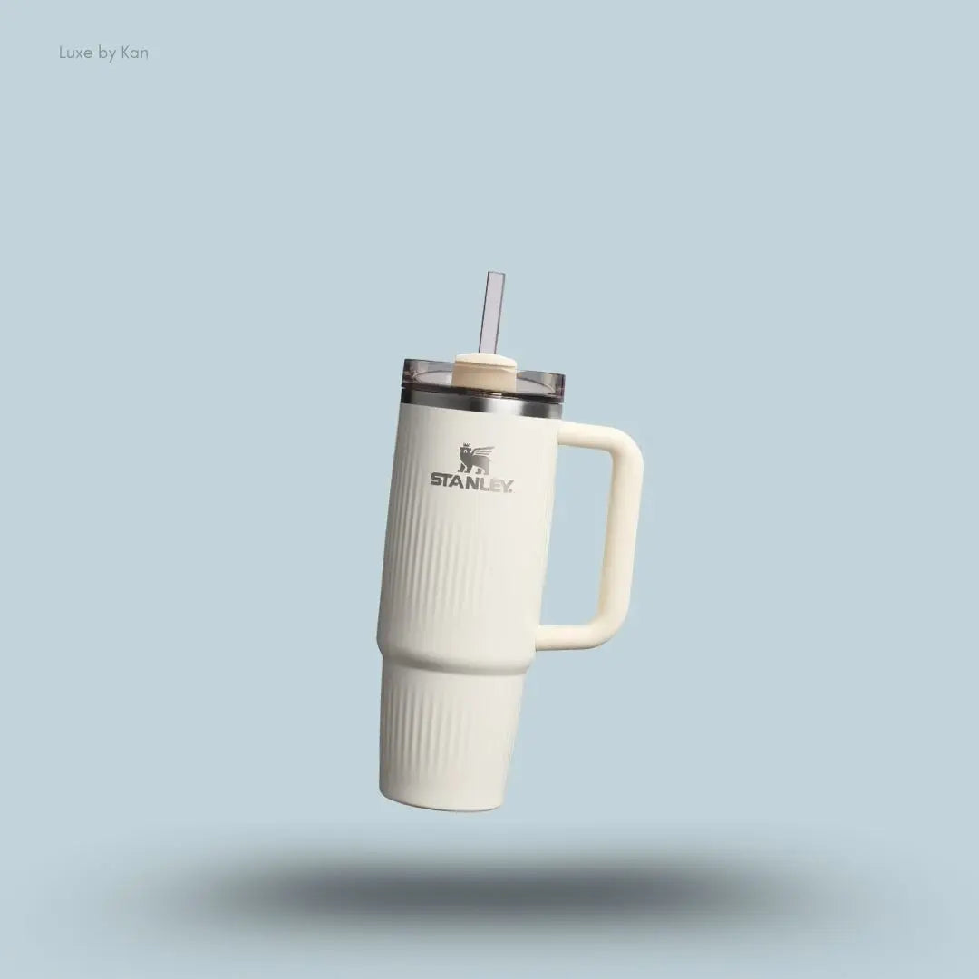 Stanley Quencher H2.0 Fluted Tumbler 0.89L Cream Gloss front view with straw and FlowState lid India