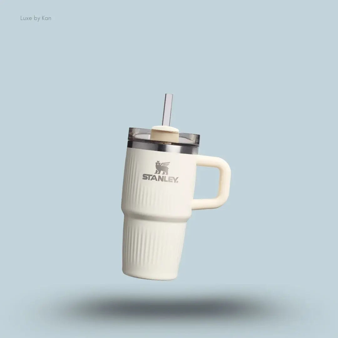 Stanley Quencher H2.0 Fluted Tumbler 0.59L Cream Gloss front view with straw and FlowState lid India