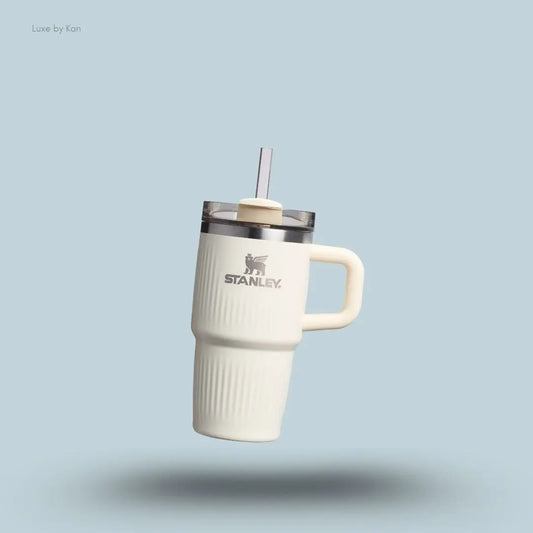Stanley Quencher H2.0 Fluted Tumbler 0.59L Cream Gloss front view with straw and FlowState lid India